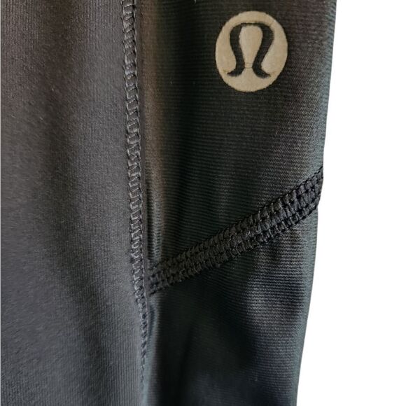 Lululemon Chase Me Black and Lime Green Capri Leggings Size 2 - Picture 5 of 7